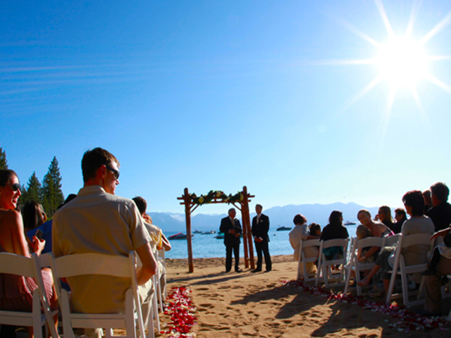 Wedding ceremony on the beach at Roundhill Pines