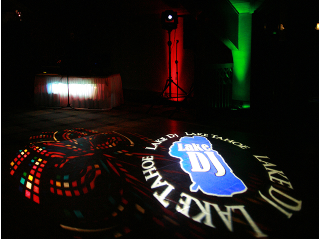 LakeDJ monogram projected onto the floor at an event