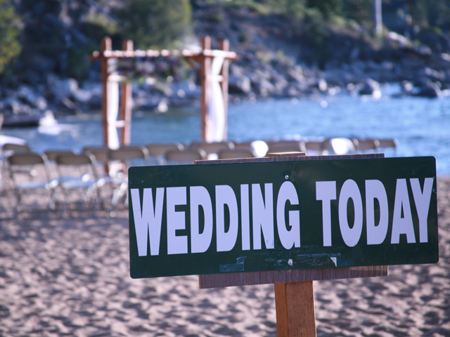 Wedding sign on the beach at Roundhill Pines