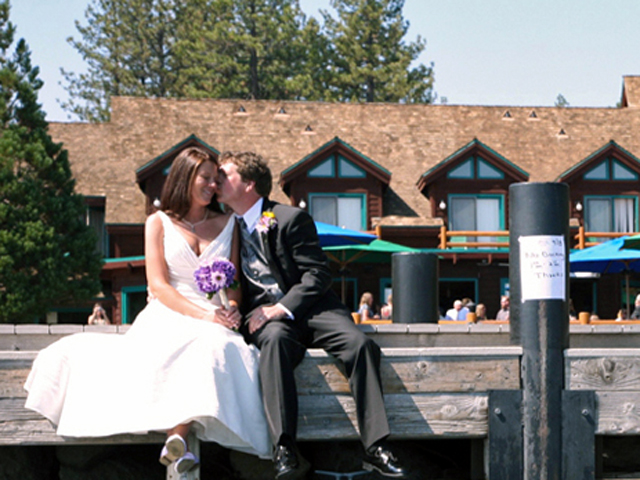 Bride and Groom on the dock at Sunnyside